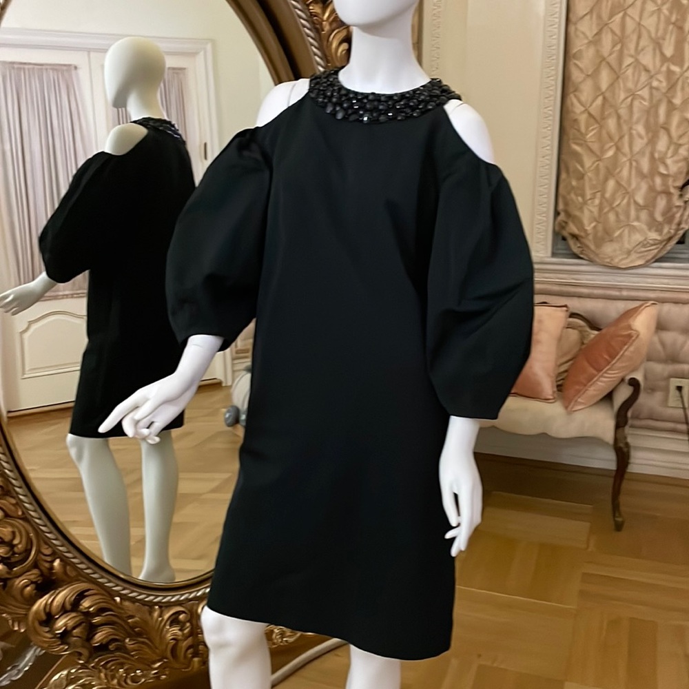 This cocktail dress very unique elegant and trendy beaded detail around neckline